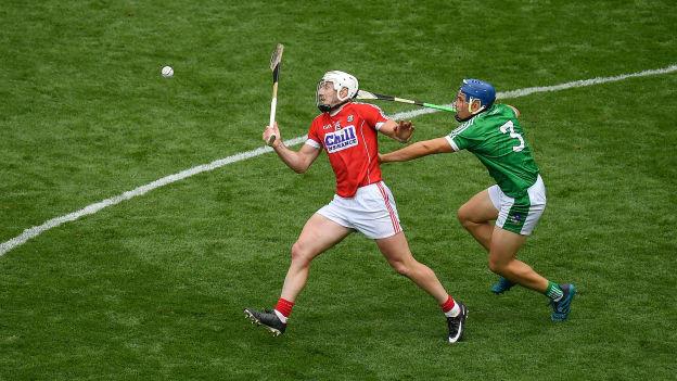 Patrick Horgan, Cork, and Mike Casey, Limerick, collide during the All Ireland SHC Semi-Final at Croke Park.