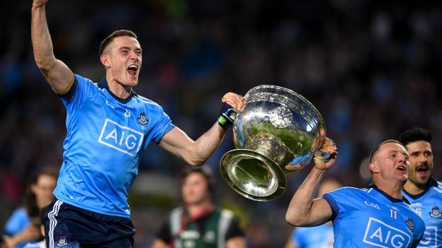Brian Fenton and Ciaran Kilkenny celebrate with the Sam Maguire Cup after victory over Kerry in the 2019 All-Ireland SFC Final replay. 