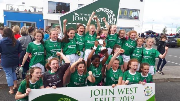 Clonguish celebrate after winning the Girls Division 4 Cup Final at the John West Féile Peile na nÓg 2019 finals.