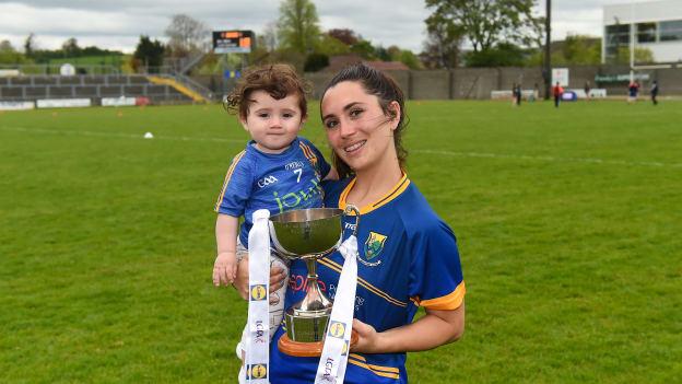 Lorna Fusciardi of Wicklow and her daughter Harley with the cup after the 2018 Lidl Ladies Football National League Division 4 Final match between Louth and Wicklow at St Brendan's Park, in Birr, Offaly.