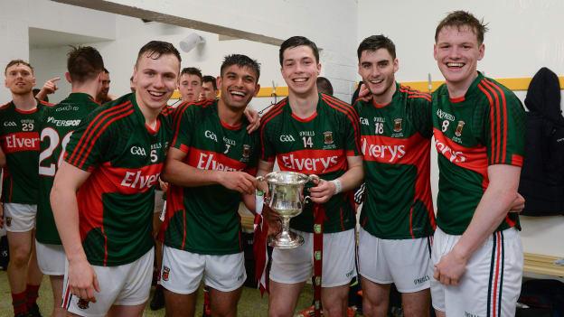 Mayo players, from left, Michael Plunkett, Shairoze Akram, Brian Reape, Eddie Doran and Matthew Ruane, celebrate with the cup after victory over Cork in the 2016 All-Ireland SFC Final. 