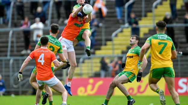 Ben Crealey, Armagh, and Jason McGee, Donegal, collide at St Tiernach's Park.