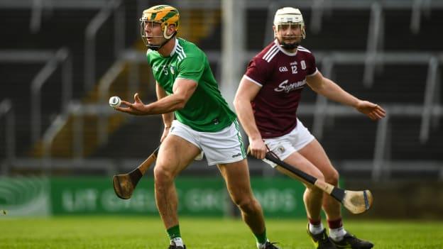 Dan Morrissey, Limerick, and Joe Canning, Galway, in Allianz Hurling League action at the LIT Gaelic Grounds.