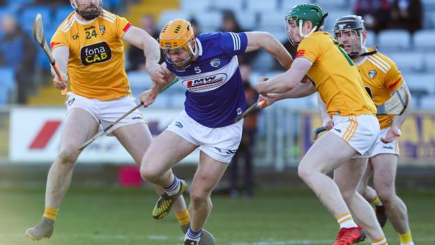 Podge Delaney of Laois in action against Conor McCann, left, and Conal Cunning of Antrim during the Allianz Hurling League Division 1 Group B match between Laois and Antrim at MW Hire O'Moore Park in Portlaoise, Laois. 