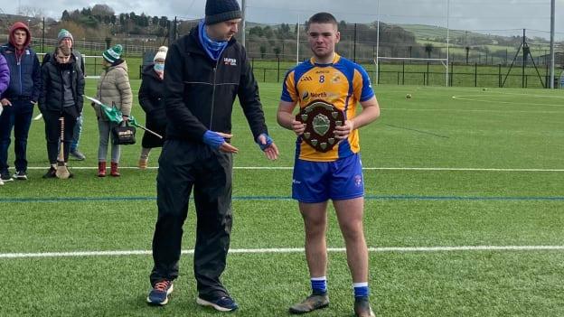 Carndonagh captain Cian Doherty pictured with the Casement Shield after his team's victory over St. Aidan's Cootehill. 