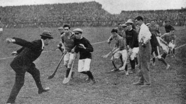 Michael Collins throwing in the sliotar to start a hurling match at Croke Park in 1921.