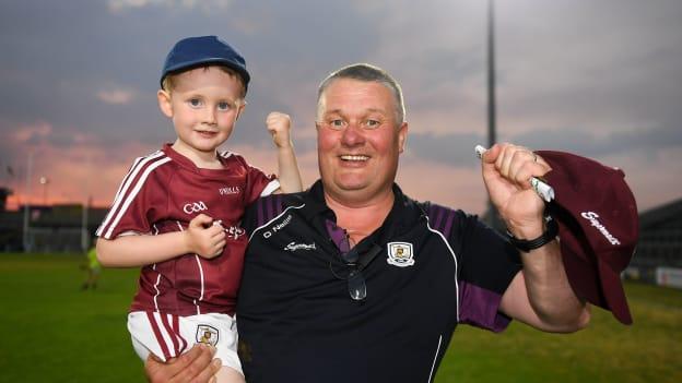 Tony Ward pictured with his grandson, Oisín, following Galway's 2018 Bord Gais Energy Leinster Under 21 Final win.