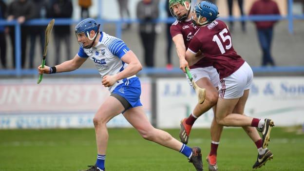 Waterford's Austin Gleeson comes away with the sliotar as Conor Cooney and Niall Burke collide at Walsh Park.