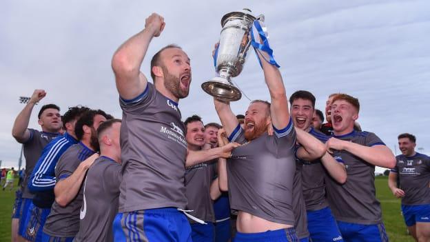 JP Rooney of Naomh Mairtin lifts the Joe Ward Cup alongside his team-mates following the Louth County Senior Football Championship Final match between Naomh Mairtin and Ardee St Mary’s at Darver Louth Centre of Excellence in Louth.