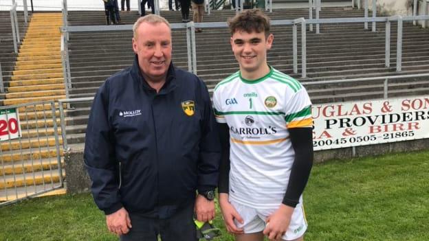 Offaly minor goalkeeper, Mark Troy, who kept a clean sheet and saved a penalty in their victory over Laois, picutured with his father Jim who won two All-Ireland senior titles as a goalkeeper with the Faithful County.