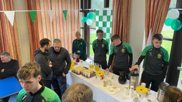 St. Malachy's Castlewellan players pictured hosting a breakfast morning for members of the local community, including Down football manager Conor Laverty, last weekend. 