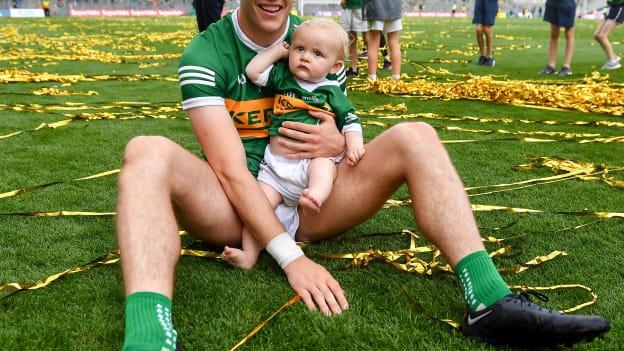David Clifford of Kerry with his son Ógie after the 2022 GAA Football All-Ireland Senior Championship Final match between Kerry and Galway at Croke Park in Dublin. Photo by David Fitzgerald/Sportsfile