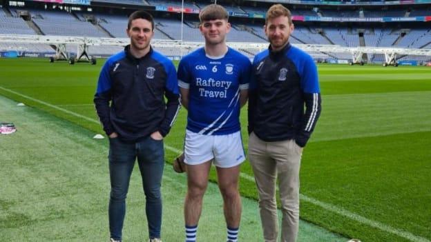Coláiste Mhuire, Ballygar captain, Conor Kelly, is flanked by team coaches Evan Niland, left, and Johnny Waldron, right. 