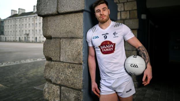 Kevin O’Callaghan of Kildare poses for a portrait with the Delaney Cup at the launch of the 2024 Leinster GAA Senior Football Championship, in the National Museum of Ireland Dublin. Photo by Brendan Moran/Sportsfile