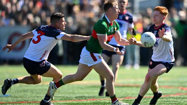 Mayo's Ryan O'Donoghue surrounded by New York's Jamie Boyle and Tiernan Mathers at Gaelic Park. Photo by Sam Barnes/Sportsfile
