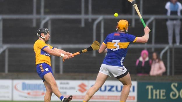 David Reidy of Clare scores a point despite the efforts of Ronan Maher of Tipperary during the Allianz Hurling League Division 1 semi-final match between Clare and Tipperary at Laois Hire O'Moore Park in Portlaoise, Laois. Photo by John Sheridan/Sportsfile.