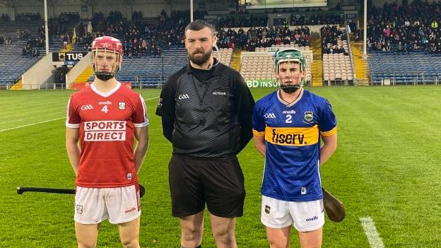 Team captains Liam Kelleher, left, and Cathal O’Reilly with referee Seaghan Walsh ahead of their Electric Ireland Munster SHC clash.