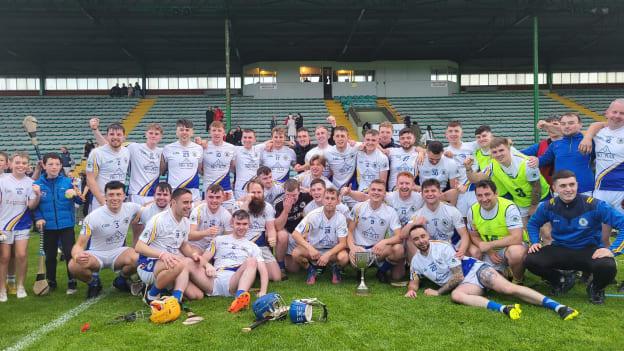 Tralee Parnells players and supporters celebrate after winning the 2023 Kerry Intermediate Hurling Championship. 