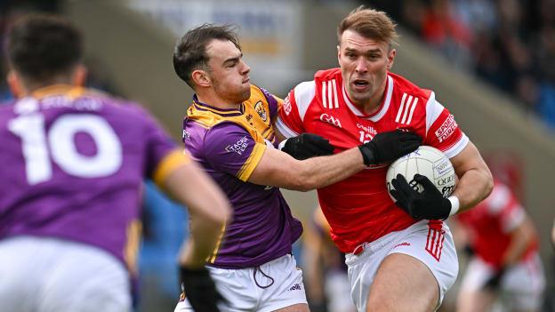 Conor Grimes, Louth, and Dylan Furlong, Wexford, in Leinster SFC action. Photo by Sam Barnes/Sportsfile