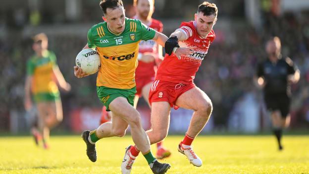 Aaron Doherty, Donegal, and Diarmuid Baker, Derry, in Ulster SFC action. Photo by Stephen McCarthy/Sportsfile