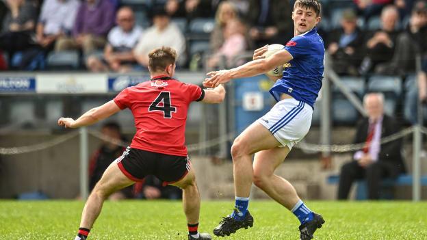 James Smith of Cavan in action against Adam Lynch of Down during the Tailteann Cup Round 1 match between Cavan and Down at Kingspan Breffni in Cavan. 