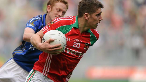 Lee Keegan in action against Kerry's Colm Cooper in the 2011 All-Ireland SFC semi-final, his first senior championship season with Mayo. 