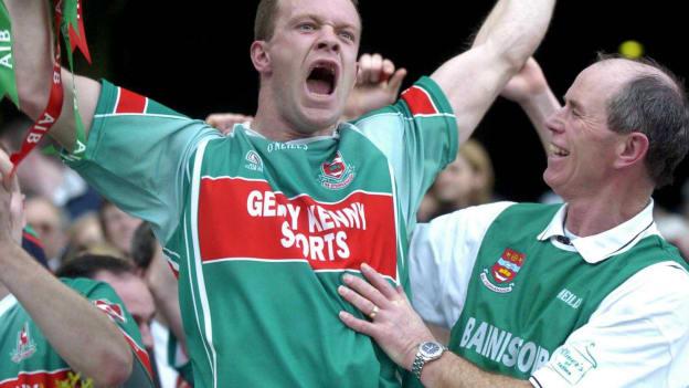 Ballina's David Brady and team manager, Tommy Lyons, celebrate after victory over Portlaoise in the 2005 AIB All-Ireland Club SFC Final. 