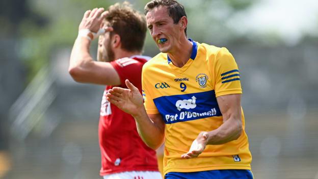 Cathal O'Connor of Clare celebrates as Ian Maguire of Cork reacts during the Allianz Football League Division 2 South Round 3 match between Clare and Cork at Cusack Park in Ennis, Clare. 