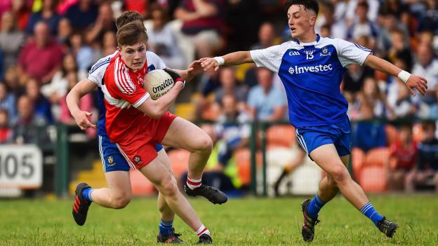 Ethan Doherty, Derry, and Brendan Og O'Dufaigh and Donnach Swinburne, Monaghan, in action at the Athletic Grounds.