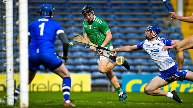 Peter Casey of Limerick has a shot on goal blocked by Conor Prunty of Waterford during the Munster GAA Hurling Senior Championship Final match between Limerick and Waterford at Semple Stadium in Thurles, Tipperary. 