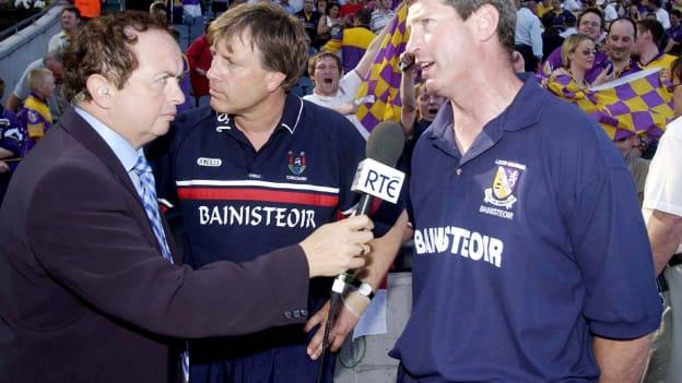 Wexford manager John Conran and Cork manager Donal O'Grady are interviewed by RTE's Marty Morrissey after the drawn 2003 All-Ireland SHC semi-final. 