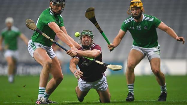 Galway's Fintan Burke under pressure from Limerick duo, Gearoid Hegarty and Tom Morrissey, in the All Ireland SHC semi-final.