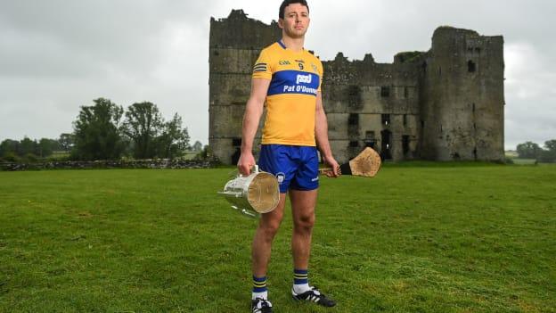 Cathal Malone of Clare poses for a portrait with the Liam MacCarthy Cup at Loughmore Castle at the GAA Hurling All-Ireland Senior Championship Series national launch in Tipperary.