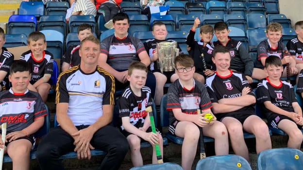 Former Kilkenny hurling star, Aidan 'Taggy' Fogarty, pictured with the Middletown Táin Óg hurlers. 