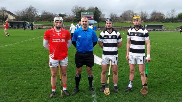 St. Raphael's captain Conor Headd, match referee Eamon Stapleton, and St. Kieran's joint captains Harry Shine and Killian Doyle pictured before today's Croke Cup quarter-final at McDonagh Park in Nenagh. 