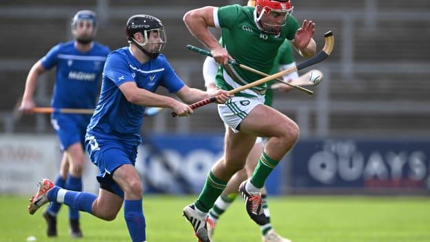 Fionan Mackessy of Ireland in action against Daniel MacCuish of Scotland during the 2023 Hurling Shinty International Game between Ireland and Scotland at Páirc Esler in Newry, Down. Photo by Piaras Ó Mídheach/Sportsfile