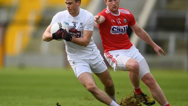 Mick O'Grady of Kildare in action against Rúairí Deane of Cork during the Allianz Football League Division 2 Round 2 match between Cork and Kildare at Páirc Uí Chaoimh in Cork. 