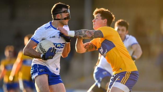 Tadhg O'hUallachain of Waterford in action against Aaron Fitzgerald of Clare during the Munster GAA Football Senior Championship quarter-final at Cusack Park in Ennis, Clare. 