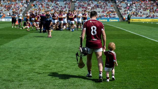 Westmeath hurler Eoin Price with his son Tadhg, age 2, after defeat to Carlow in the 2019 Joe McDonagh Cup Final.