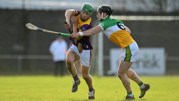 Richie Lawlor, who impressed for Wexford against Offaly this afternoon in Birr, pictured here carrying the ball into the tackle against Jason Sampson. 