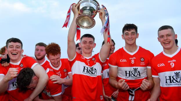 Derry captain Matthew Downey lifts the cup as he celebrates with team-mates after their side's victory in the Electric Ireland Ulster GAA Football Minor Championship Final 2020 match between Monaghan and Derry at Healy Park in Omagh, Tyrone.