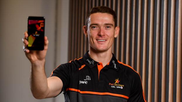 2018 PwC Player of the Year in football Brian Fenton was given a demonstration of the improved PwC All-Stars app at their head offices in Dublin yesterday. 