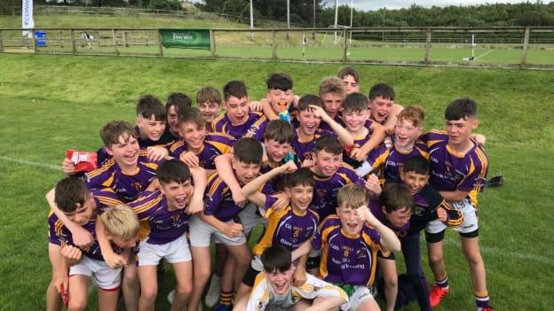 The Kilmacud Crokes players celebrate after winning the Boys Division 1 Cup at the John West Féile Peile na nÓg 2019 finals.