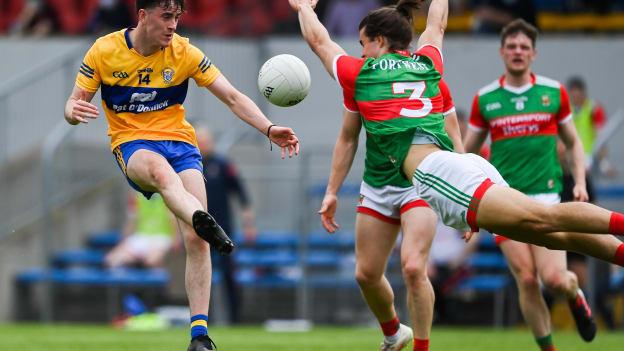 Oisin Mullin of Mayo blocks a shot by Joe McGann of Clare during the Allianz Football League Division 2 semi-final match between Clare and Mayo at Cusack Park in Ennis, Clare. 