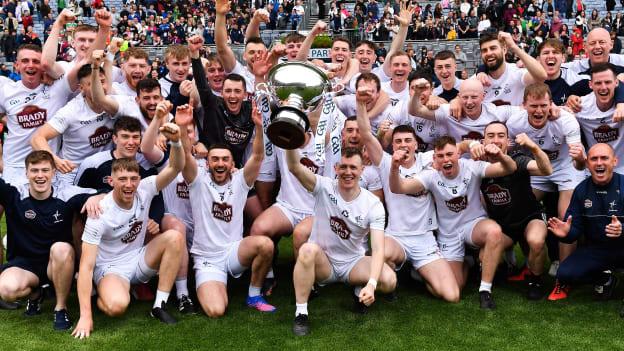 Kildare captain Brian Byrne lifts the 2022 Christy Ring Cup alongside his fellow Kildare players. 