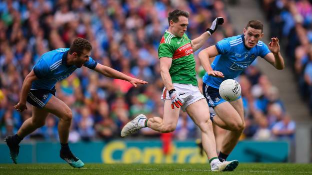Mayo's Paddy Durcan surrounded by Dublin's Brian Fenton and Jack McCaffrey.