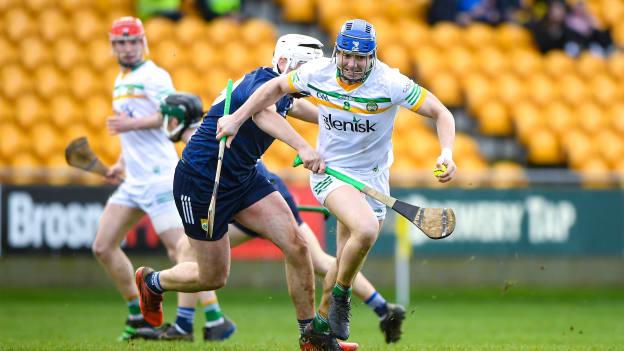 Jack Clancy of Offaly drives past Kerry's Jason Diggins during this afternoon's Allianz League Division 2A semi-final at Glenisk O'Connor Park in Tullamore.