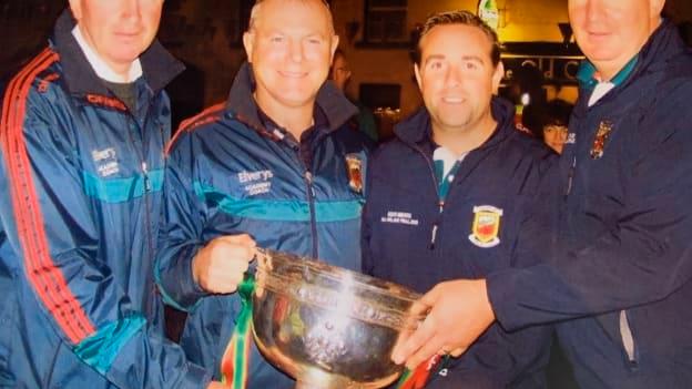 Left to right,  Mayo Games Promotion Officer Eugene Lavin, Mayo Games Manager Billy McNicholas, Mayo Games Promotion Officer Eoin Sweeney, and Mayo Games Promotion Officer Martin Costello pictured with the Tom Markham Cup after Mayo's 2013 All-Ireland Minor Final win over Tyrone.