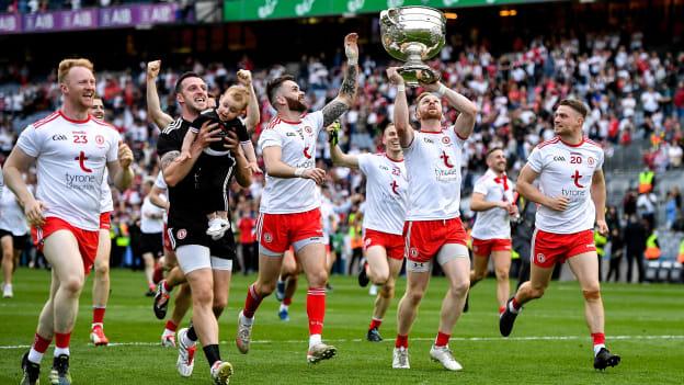 Tyrone players, led by Frank Burns celebrate with the Sam Maguire Cup after their side's victory over Mayo in the GAA Football All-Ireland Senior Championship Final match at Croke Park in Dublin. 