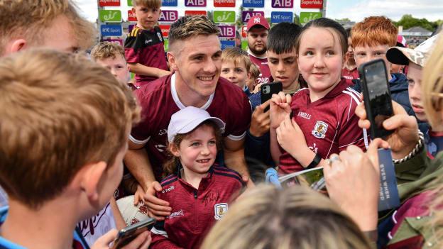 Shane Walsh of Galway poses for photographs with supporters after his side's victory in the Connacht GAA Football Senior Championship Final match between Galway and Roscommon at Pearse Stadium in Galway.